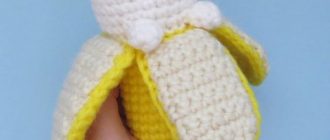 Toy crochet amigurumi banana-cat